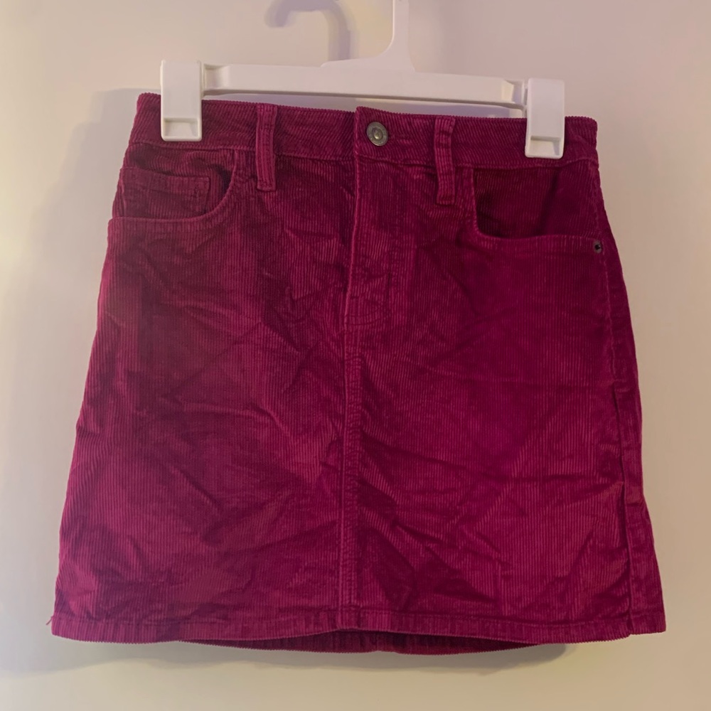 The 5 pocket mini skirt. Wild aster color. Shell-78% cotton-20%